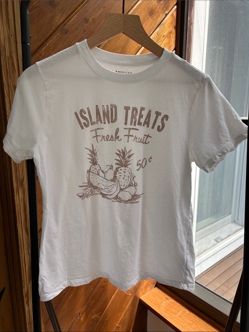 American Eagle Outfitters White Tee with Beige 'Island Treats' Graphic